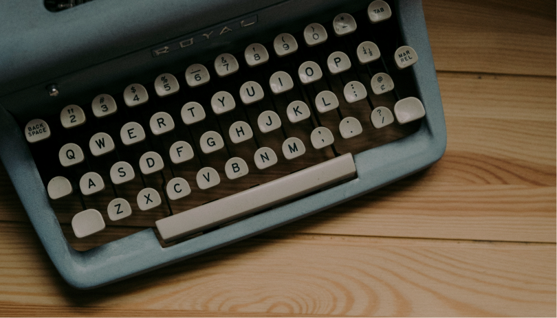 Image of a typewriter on a desk