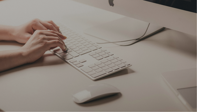 Image of someone typing on a keyboard to illustrate a UK visa invitation letter